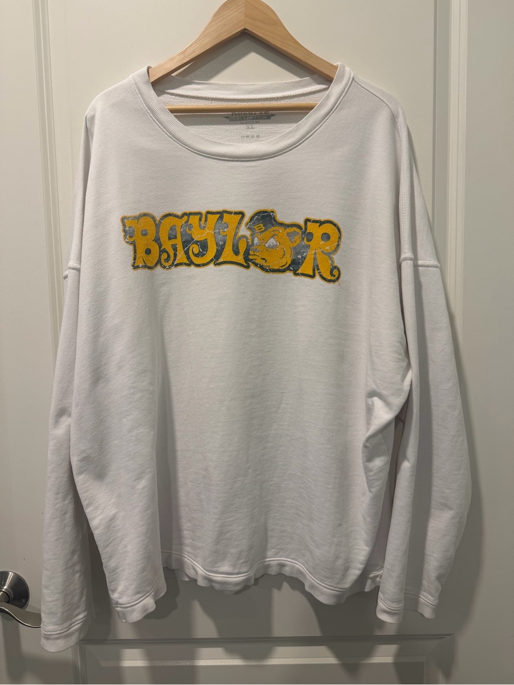 White Baylor Graphic Sweatshirt with distressed Yellow Logo